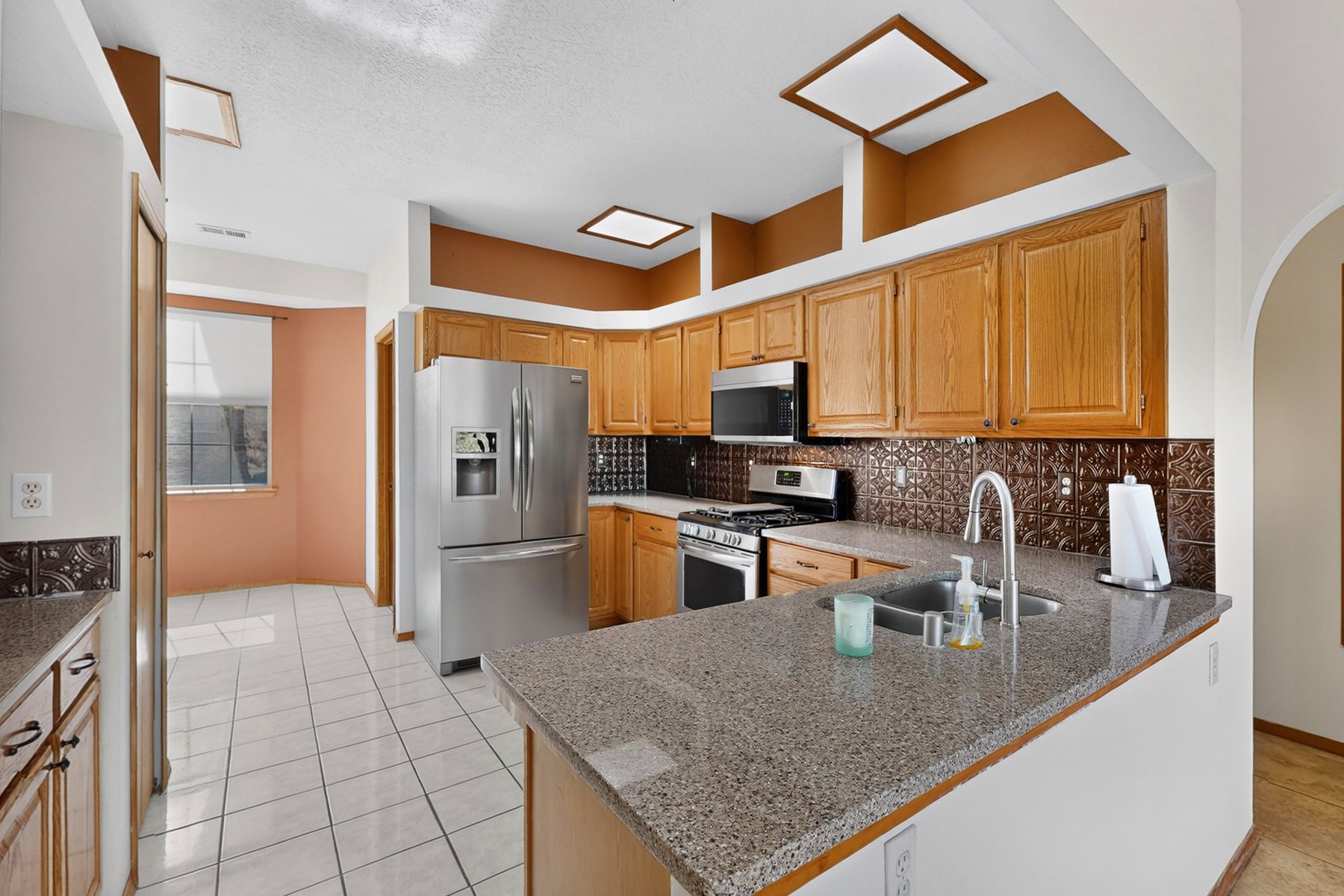 Kitchen with granite counters and stainless appliances
